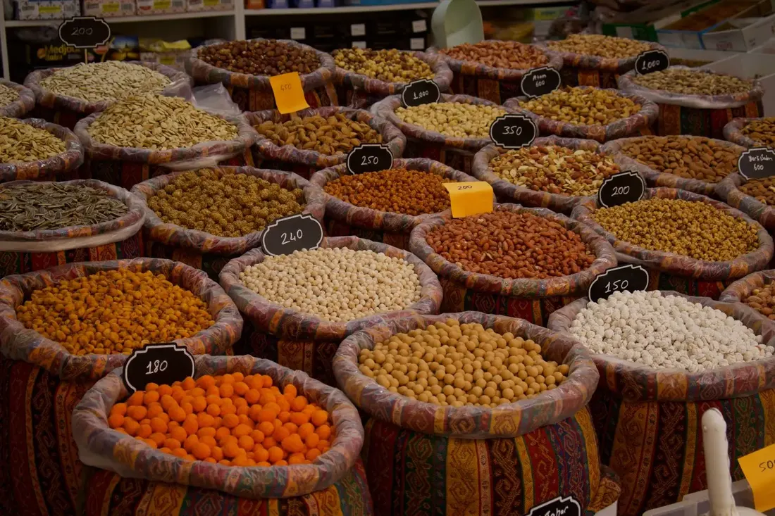 Market display of different nuts and dry foods